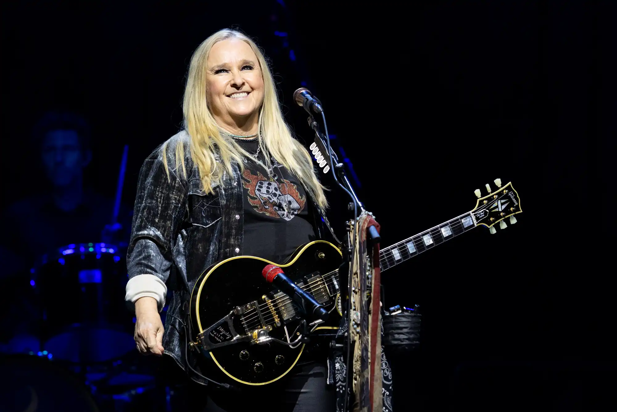 Melissa Etheridge performing on tour